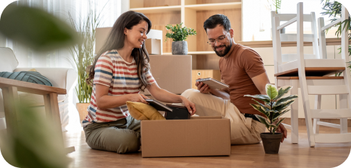 Image of couple unpacking boxes